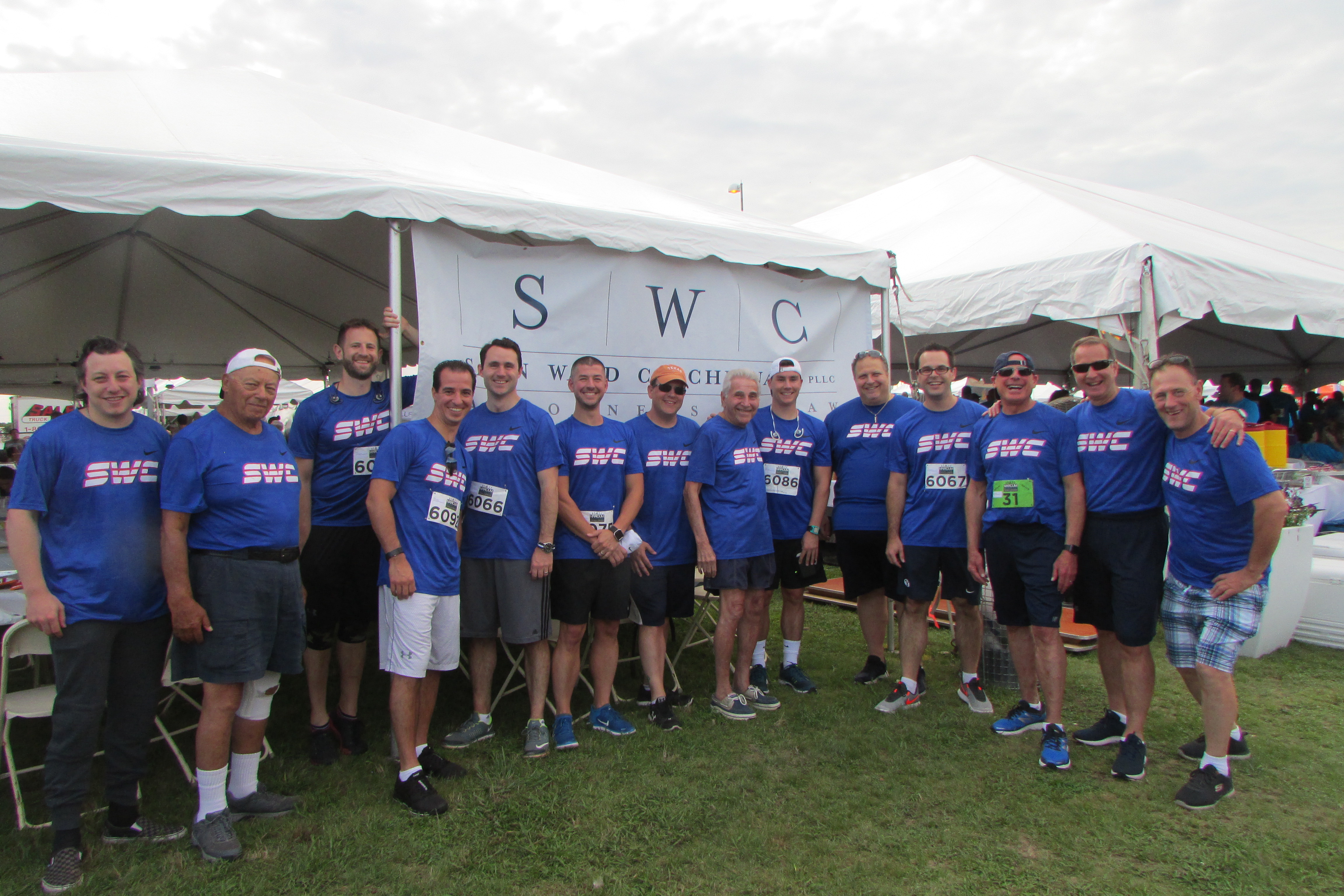 Attorneys and staff members from the Firm join together for a photo at the 2018 Marcum Workplace Challenge.
