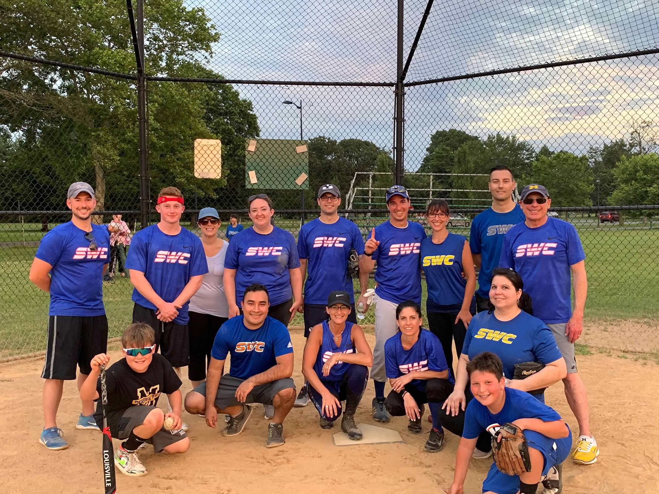 SWC in softball uniforms on the field